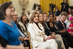 House Speaker Nancy Pelosi listens as President Joe Biden delivers remarks at a Women’s History Month event, Tuesday, March 15, 2022, in the East Room of the White House.