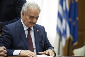 Libyan Gen. Khalifa Hifter looks on during his meeting with Greek Prime Minister Kyriakos Mitsotakis, in Athens, Friday, Jan. 17, 2020