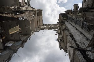 A view of the headquarters of the Mykolaiv Regional Military Administration building destroyed by a Russian attack in Mykolaiv, Ukraine, Friday, Aug. 5, 2022.