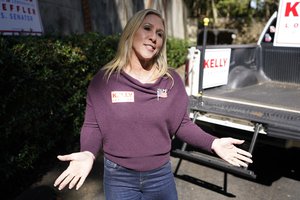 Republican candidate for Georgia's 14th congressional seat Marjorie Taylor Greene is shown during a campaign rally for Sen. Kelly Loeffler Saturday, Oct. 31, 2020, in Roswell