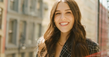 headshot of woman with brown hair in New York