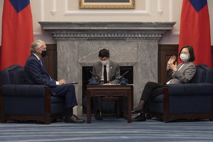 In this photo released by the Taiwan Presidential Office, Taiwan's President Tsai Ing-wen meets with U.S. Democrat Sen. Ed Markey of Massachusetts at the Presidential Office in Taipei, Taiwan on Monday, Aug. 15, 2022