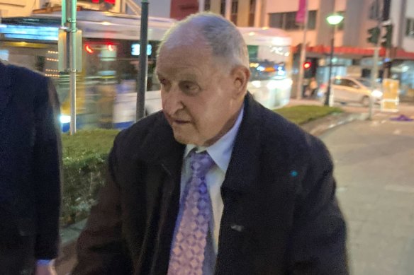 Frank Terrence Keating (right) leaves Brisbane Magistrates Court with lawyer Terry O’Gorman (left).