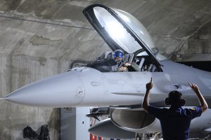 A Taiwanese airforce F16V fighter jet takes part in night drill from the Hualien Airbase in Taiwan's southeastern Hualien county on Wednesday, Aug. 17, 2022