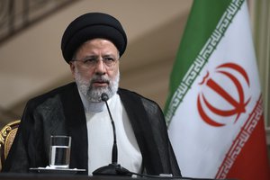 Iranian President Ebrahim Raisi speaks during a joint press briefing with his Turkish counterpart Recep Tayyip Erdogan at the Saadabad Palace, in Tehran, Iran, Tuesday, July 19, 2022