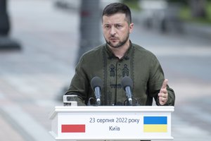 Ukrainian President Volodymyr Zelenskyy speaks during a joint news conference with Polish President Andrzej Duda in Kyiv, Ukraine, Tuesday, Aug. 23, 2022