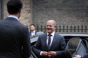 German Chancellor Olaf Scholz is greeted by Dutch Prime Minister Mark Rutte, left, in The Hague, Netherlands, Thursday, May 19, 2022.