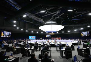 Ukraine's President Volodymyr Zelenskyy addresses a round table meeting via video link during a NATO summit in Madrid, Spain on Wednesday, June 29, 2022.