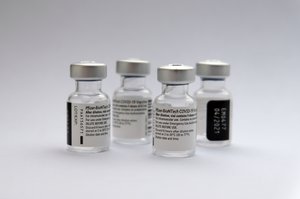 4 empty ampoules of the vaccine against Sars Covid 19 from Biontech/Pfizer, Jan. 2021