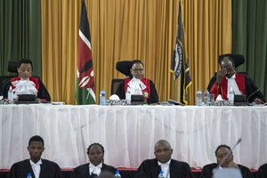 From left to right, Kenya's Supreme Court judges Deputy Chief Justice Philomena Mbete Mwilu, Chief Justice Martha Koome, and Mohammed Khadhar Ibrahim, deliver judgement in the electoral petition at the Supreme Court in Nairobi, Kenya, Monday, Sept. 5, 2022