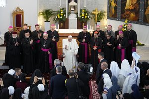 Pope Francis smiles at the end of a meeting with priests, religious men and women, seminarians and catechists at the Our Lady Of Perpetual Help Cathedral in Nur-Sultan, Kazakhstan, Thursday, Sept. 15, 2022.