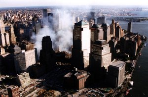 NEW YORK, New York (Sept. 15)--The burning World Trade Center complex fills lower Manhattan with smoke September 15.  USCG photo by PAC Brandon Brewer (117907) ( WORLD TRADE CENTER ATTACK (FOR RELEASE) )