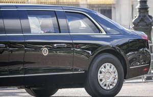 U.S President Joe Biden travels in a convoy passing Buckingham Palace in London, England, Sunday, Sept. 18, 2022.