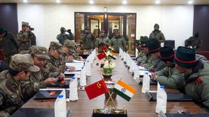 Indian and Chinese Army Jawans at Ceremonial Border Personnel Meeting( BPMs) on the occassion of " Harvest Festival" at Indian BPM hut in Chushul in eastern Ladakh, India, 12 April 2017.