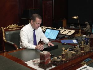 File - Russian Deputy head of Russia's Security Council Dmitry Medvedev votes remotely in elections of municipal deputies at the Gorky state residence, outside Moscow, Russia, Saturday, Sept. 10, 2022.