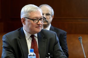 FILE - In this Tuesday, Oct. 15, 2013 file photo Russian Deputy Foreign Minister Sergei Ryabkov looks on at the start of the two days of closed-door nuclear talks on at the United Nations offices in Geneva, Switzerland.