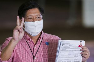 Former senator Ferdinand “Bongbong” Marcos Jr. poses after filing his certificate of candidacy for next year’s presidential elections with the Commission on Elections at the Sofitel Harbor Garden Tent in Metropolitan Manila, Philippines on Wednesday, Oct. 6, 2021