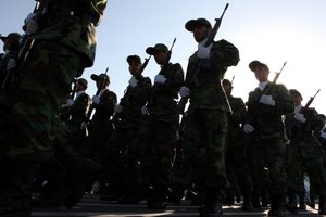 Members of Iranian Corps Guards of the Islamic Revolution forces parade during large-scale military parades in Tehran to mark the 27th anniversary of the Iraqi invasion of Iran that sparked the bloody 1980-88 war, in Tehran, Iran in this photo taken on Saturday Sep. 22, 2007.