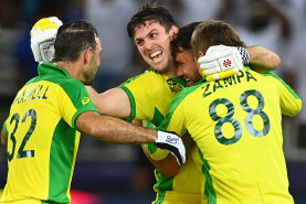 Mitchell Marsh and Marcus Stoinis embrace after Australia’s T20 World Cup victory in the UAE.