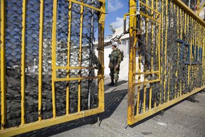 An Israeli soldier stands in the Rosh Hanikra border crossing between Israel and Lebanon in northern Israel, Wednesday, Oct. 14, 2020.