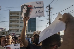 Protesters gather in Sulaimaniyah on Sept. 28, 2022, protest the killing of Mahsa Amini, an Iranian Kurdish woman after she was arrested in Tehran by morality police for wearing her headscarf improperly