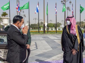 Saudi Crown Prince Mohammed bin Salman, right, receives Thai Prime Minister Prayuth Chan-ocha, at the royal palace in Riyadh, Saudi Arabia, Tuesday, Jan. 25, 202