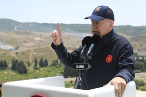 In this handout photo provided by the Turkish Presidency, Turkish President Recep Tayyip Erdogan speaks during the final day of military exercises that were taking place in Seferihisar near Izmir, on Turkey's Aegean coast, Thursday, June 9, 2022