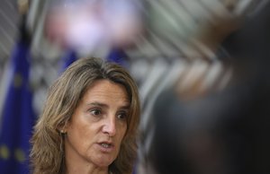 Spain's Environment Minister Teresa Ribera speaks with the media as she arrives for a meeting of EU energy ministers at the European Council building in Brussels, Friday, Sept. 9, 2022.