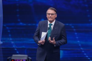 Brazil's President Jair Bolsonaro, who is running for reelection, speaks during a presidential debate against former president Luiz Inacio Lula da Silva at Bandeirantes Television in Sao Paulo, Brazil, Sunday, Oct. 16, 2022