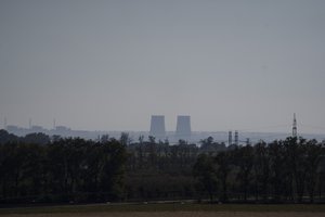 Zaporizhzhia nuclear power plant is seen from around twenty kilometers away in an area in the Dnipropetrovsk region, Ukraine, Monday, Oct. 17, 2022.