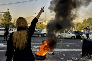 File - In this photo taken by an individual not employed by the Associated Press and obtained by the AP outside Iran, Iranians protests the death of 22-year-old Mahsa Amini after she was detained by the morality police, in Tehran, Oct. 1, 2022.