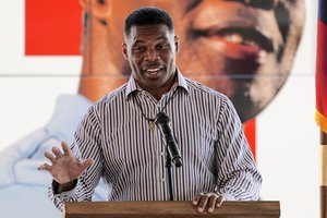 FILE - Republican candidate for U.S. Senate Herschel Walker speaks during a campaign stop in Dawsonville, Ga., Oct. 25, 2022.