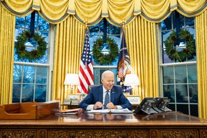 Joe Biden talks on the phone with Senate Majority Leader Charles “Chuck” Schumer, D-N.Y., Wednesday, December 1, 2021, in the Oval Office