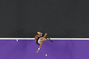 Aryna Sabalenka, of Belarus, serves to Caroline Garcia, of France, in the singles final of the WTA Finals tennis tournament in Fort Worth, Texas, Monday, Nov. 7, 2022