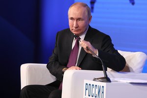 Russian President Vladimir Putin speaks during a meeting with historians and representatives of traditional religions of Russia