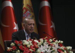 Turkey's President Recep Tayyip Erdogan speaks at a joint news conference with Spanish Prime Minister Pedro Sanchez after their talks at the presidential palace, in Ankara, Turkey, Wednesday, Nov. 17, 2021.