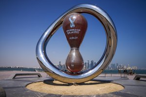 The official FIFA World Cup Countdown Clock on Doha's corniche, overlooking the skyline of Doha, Qatar, Wednesday, Oct. 19, 2022