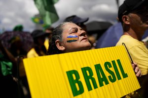 A supporter of President Jair Bolsonaro attends a protest against his defeat in the presidential runoff election, in Rio de Janeiro, Brazil, Sunday, Nov 6, 2022.