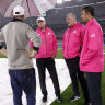 MCG curator Matt Page confers with umpires at the MCG during the washed out game between Australia and England.