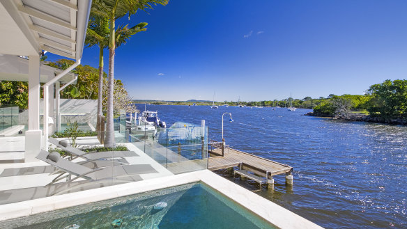 The two-level luxury house at Noosa Heads has four bedrooms.