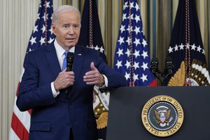 President Joe Biden answers questions from reporters as he speaks in the State Dining Room of the White House in Washington, Wednesday, Nov. 9, 2022