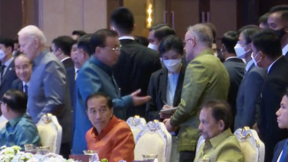 China’s Li Keqiang and Anthony Albanese speak through an interpreter at the ASEAN gala dinner on Saturday.