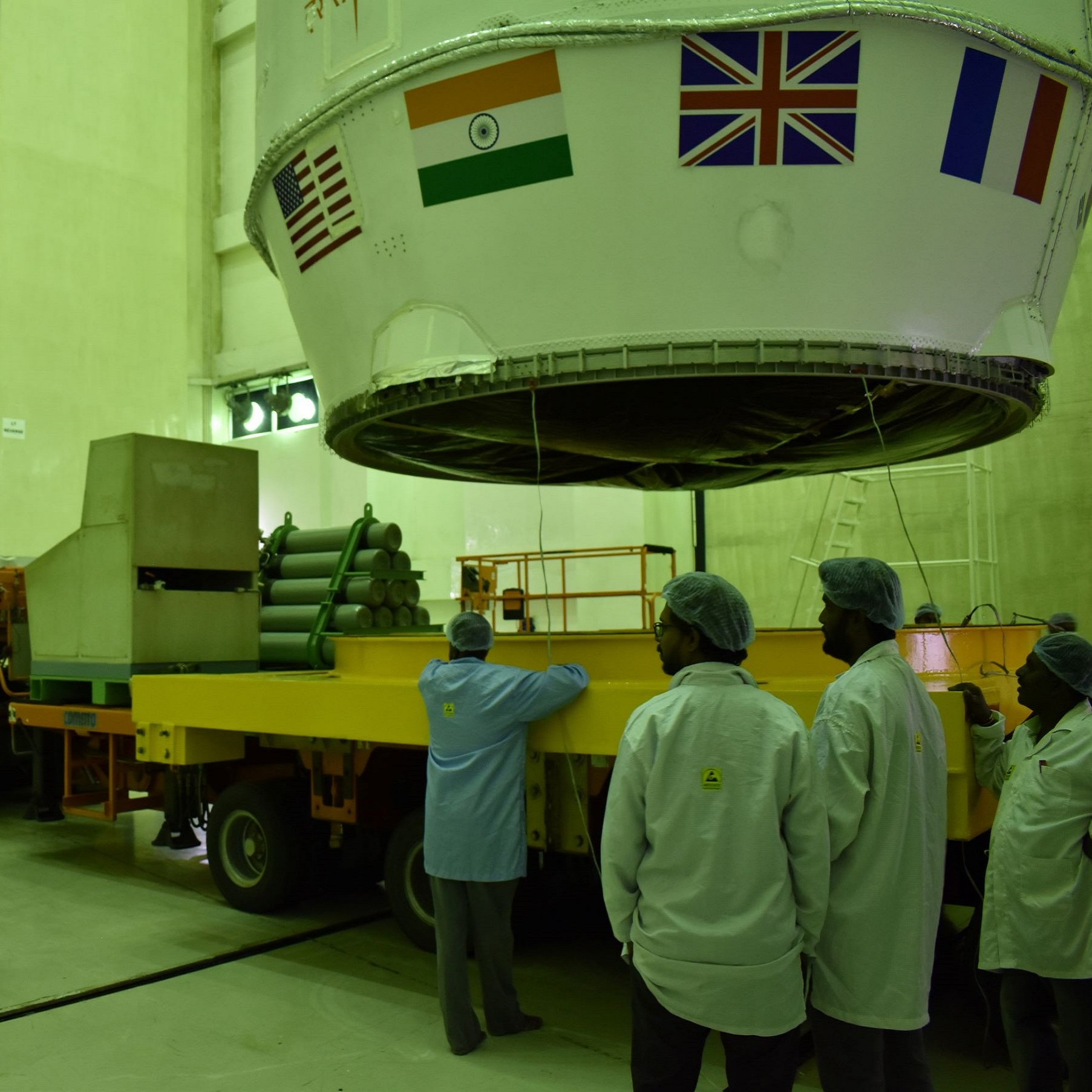 Satellites being loaded onto truck