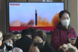 A TV screen shows an image of North Korea's missile launch during a news program at the Seoul Railway Station in Seoul, South Korea, Saturday, Nov. 19, 2022