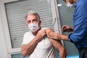 A person getting vaccinated against COVID-19, Aulnay-sous-Bois, France