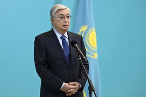 In this photo released by Kazakhstan's Presidential Press Service, Kazakhstan's President Kassym-Jomart Tokayev speaks to the media after voting at a polling station in the Al-Farabi Schoolchildren Palace during the Nationwide Referendum in Nur-Sultan, Kazakhstan, Sunday, June 5, 2022