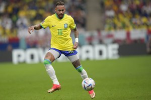 Brazil's Neymar controls the ball during the World Cup group G soccer match between Brazil and Serbia, at the Lusail Stadium in Lusail, Qatar, Thursday, Nov. 24, 2022