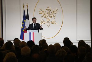 France's President Emmanuel Macron delivers a speech as he hosts a reception for the mayors of France at the Elysee Palace in Paris, Wednesday, Nov. 23, 2022