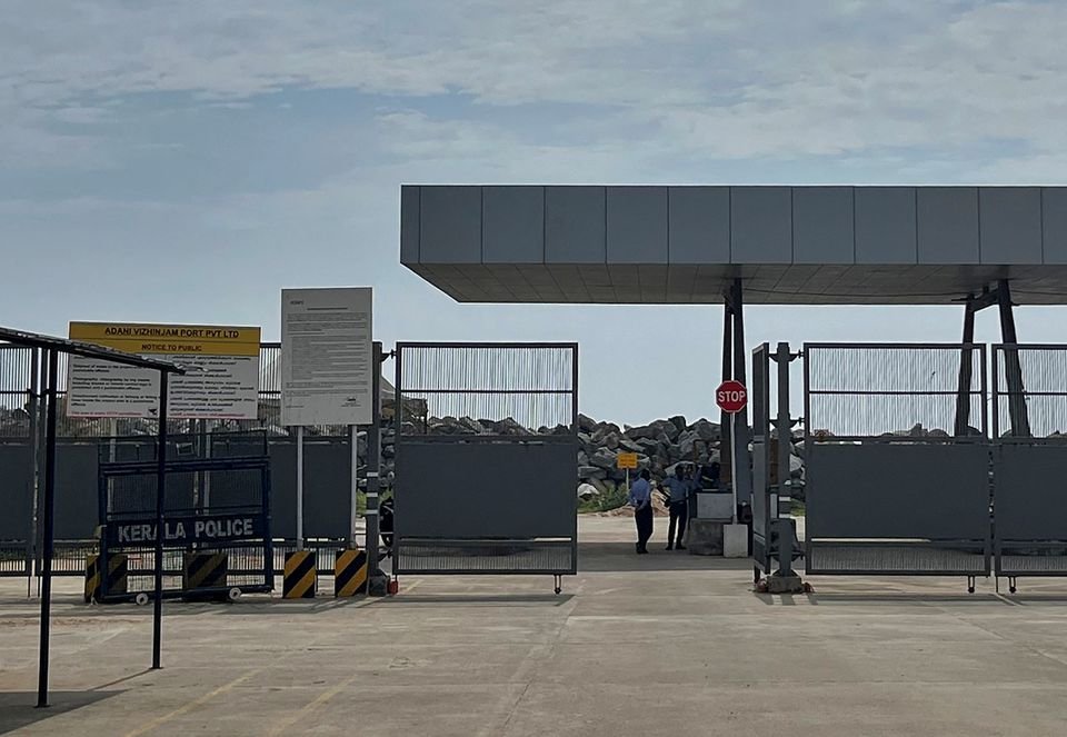 Private security guards stand near an entrance of the proposed Vizhinjam Port in the southern state of Kerala, India.