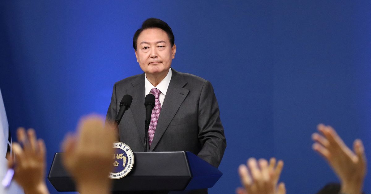 South Korea's President Yoon Suk-yeol holds his first official news conference, after taking office in May, to mark 100 days in office, in Seoul, South Korea August 17, 2022. Chung Sung-Jun/Pool via REUTERS